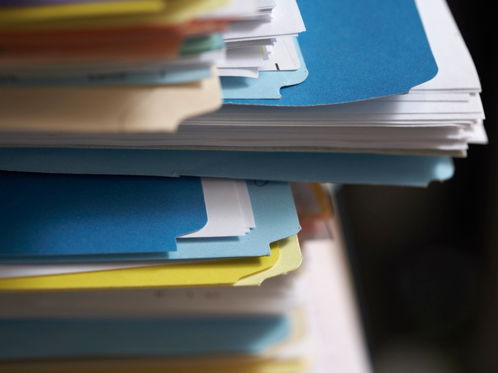 Corner of stack of files, close-up